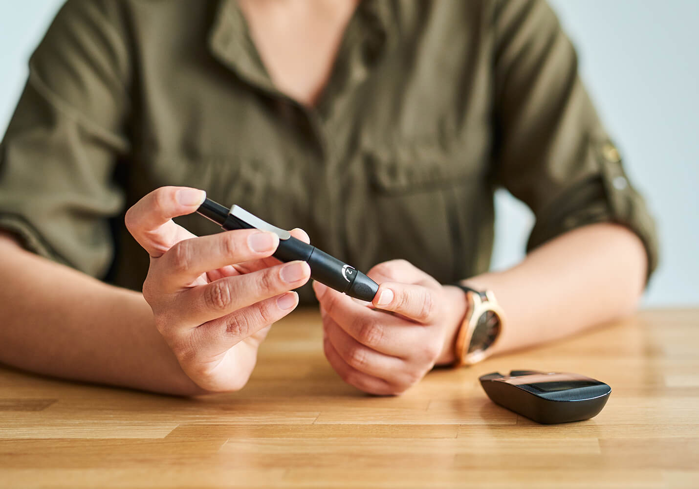 person testing blood sugar level