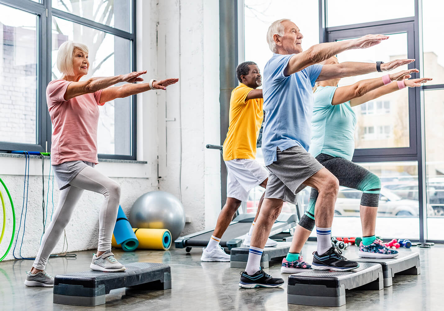 Senior citizens in exercise class