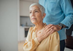 Concerned woman being comforted