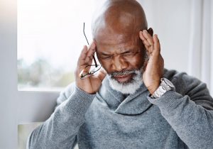 Man experiencing a headache