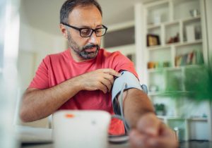 Man measuring blood pressure