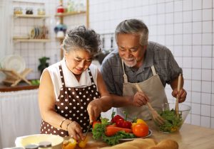 Senior couple preparing a healthy meal