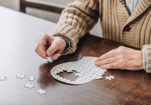 Man completing a puzzle