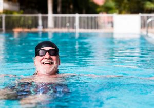 Elderly man enjoying swimming